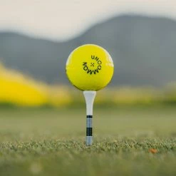 Uncommon Model 55 Golf Ball - Open Invite Edition / Electric Yellow / Dozen 10 Uncommon Model 55 Golf Ball - Open Invite Edition / Electric Yellow / Dozen -Ace Golf Clubs Store uncommon model 55 open invite edition 1